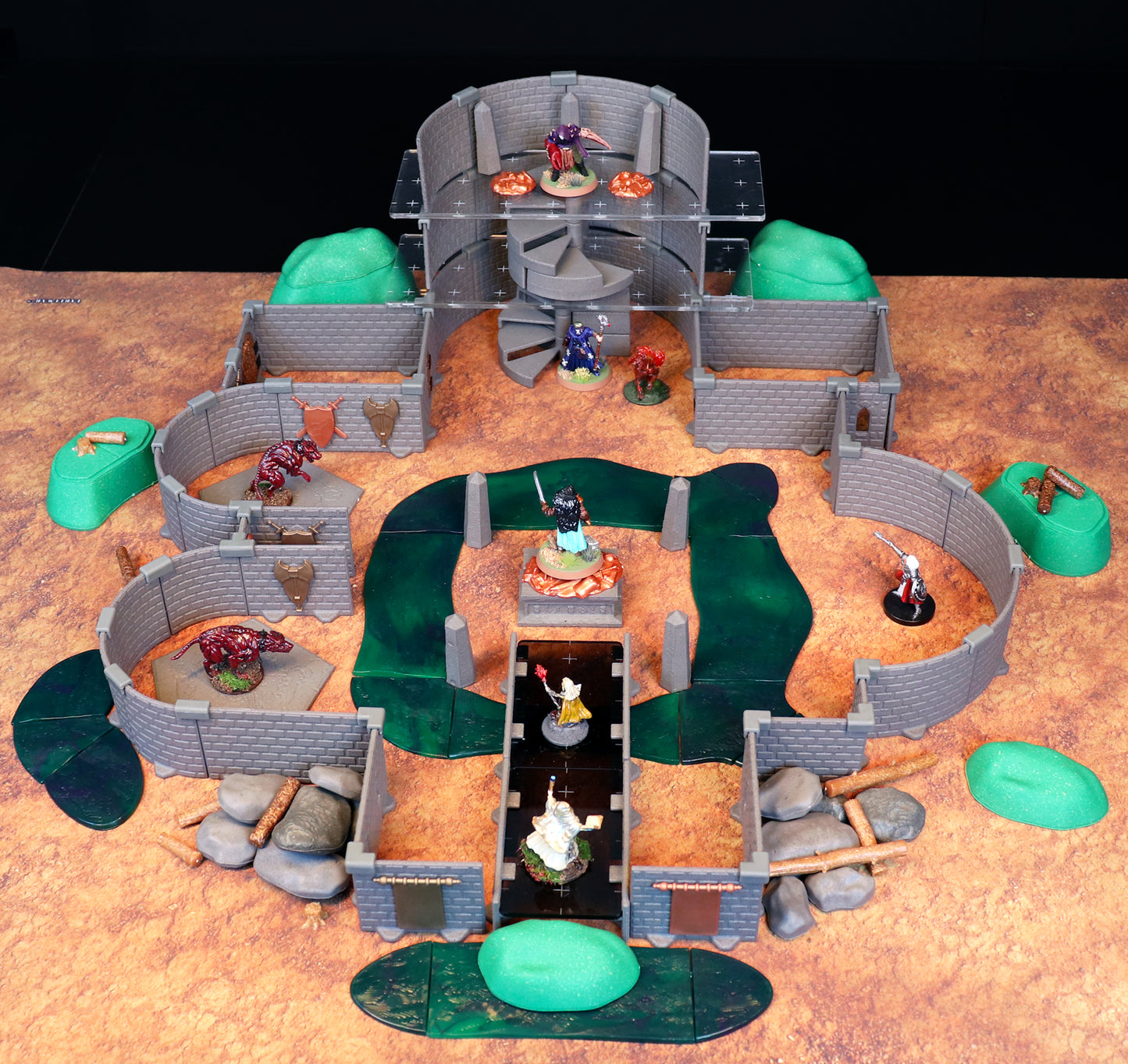Wide view of the fully assembled modular layout of the Lich Sanctorum Set, showcasing the stone ruins, Spiral Staircase System, and sections of the unique green Putrid Waterways terrain.