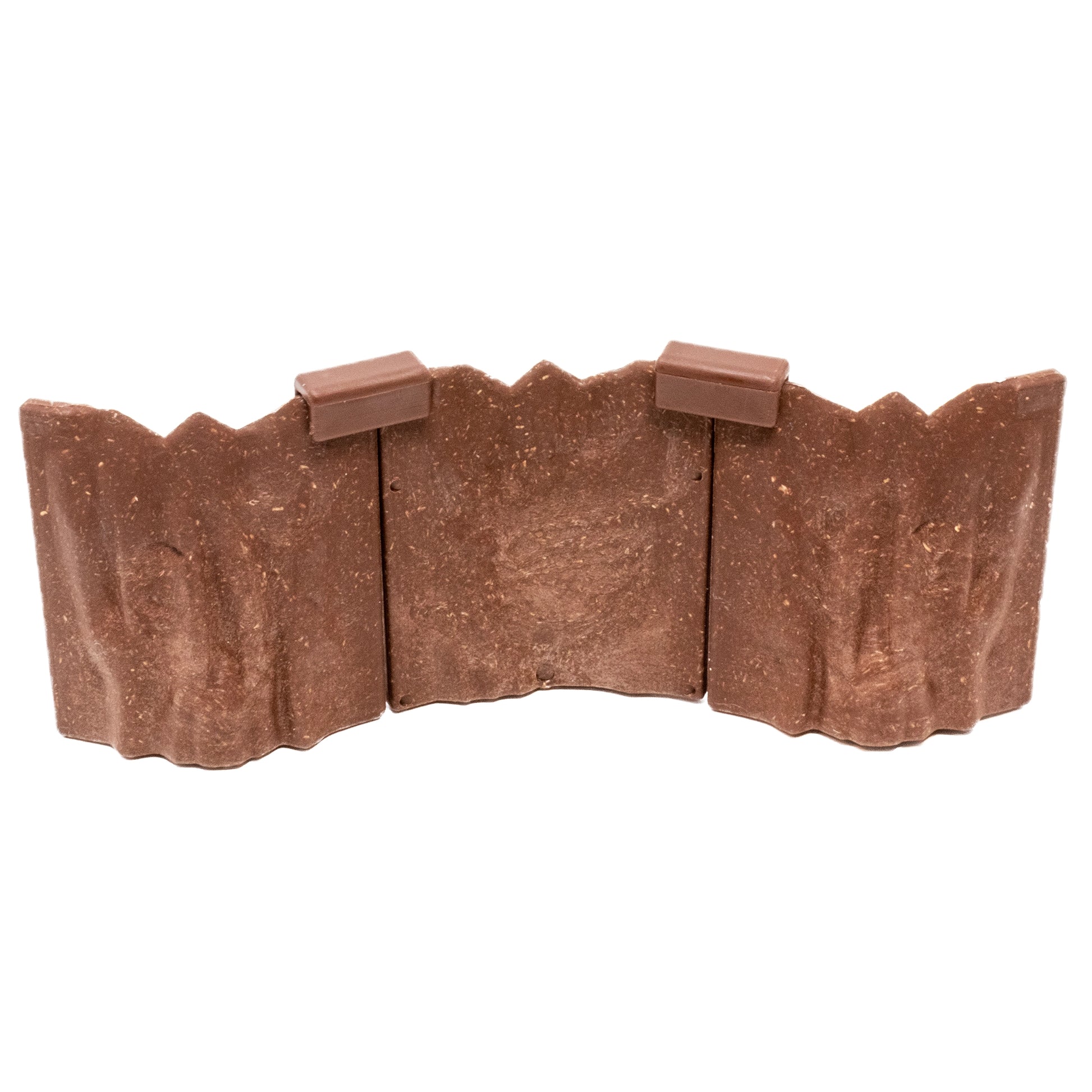 Isolated, detailed close-up of three connected Ogre Cavern modular wall pieces, clearly showing the brown, rugged rock texture and the dark clips used for assembly.