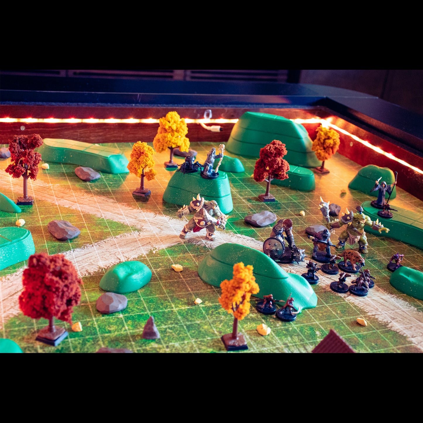 A view of the Owlbear Terrain Core Set assembled in an alternate configuration, demonstrating the flexibility and modularity of the outdoor terrain for various wilderness encounters.