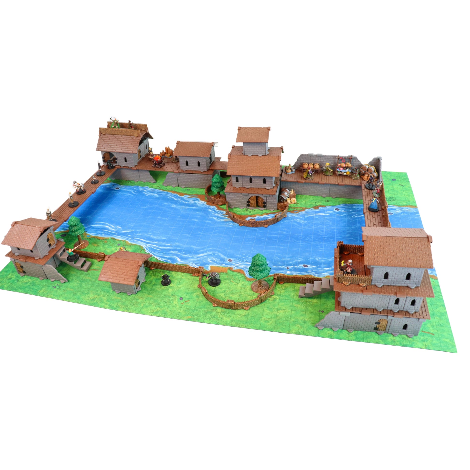 Scene focused on the Palisade Kit fencing sections, showing fantasy miniatures defending the perimeter of the modular town created by the Village of the Lost Bundle for a siege scenario.