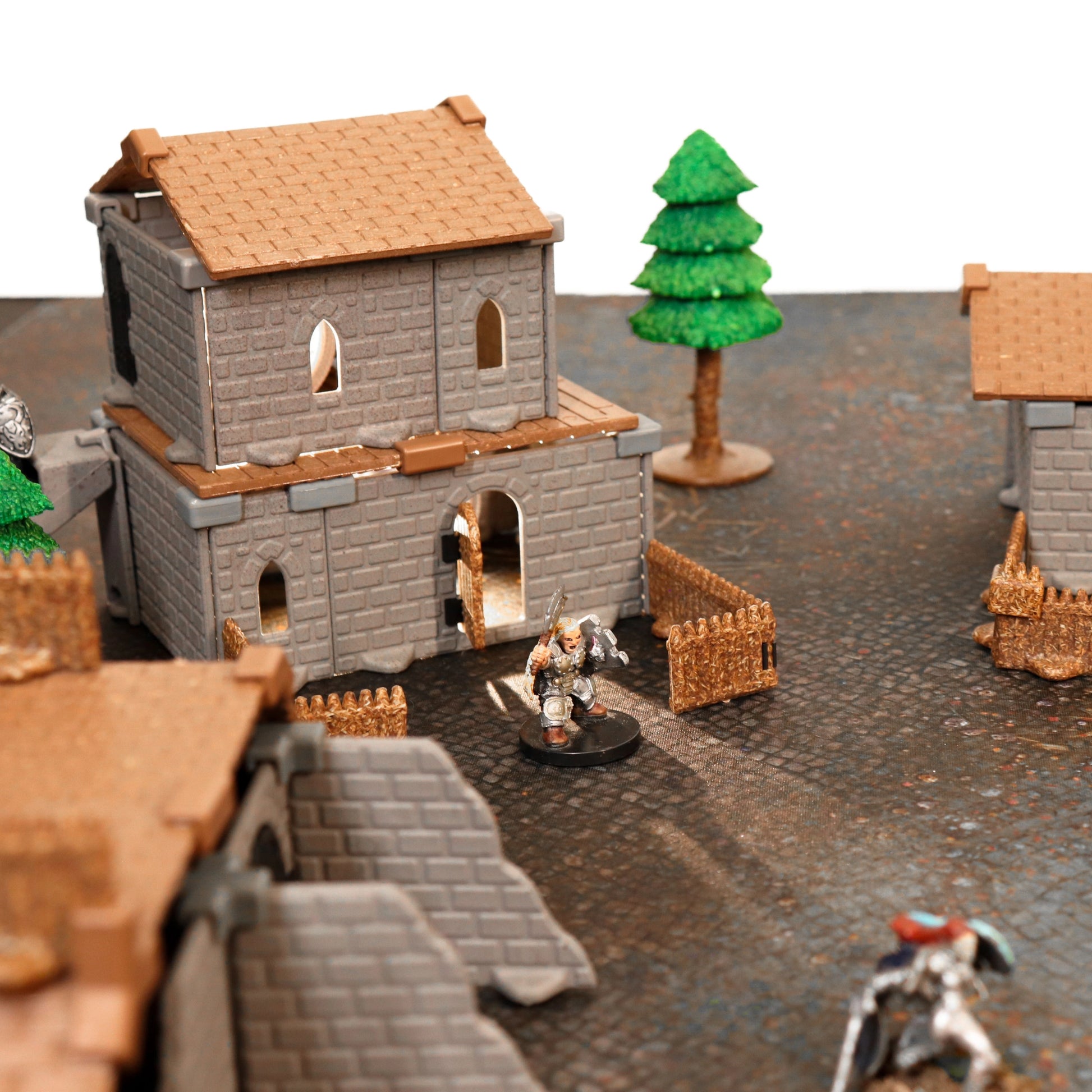 A closeup shot of a guardhouse allowing for the textures of the walls,roofs and palisades to be clearly seen.