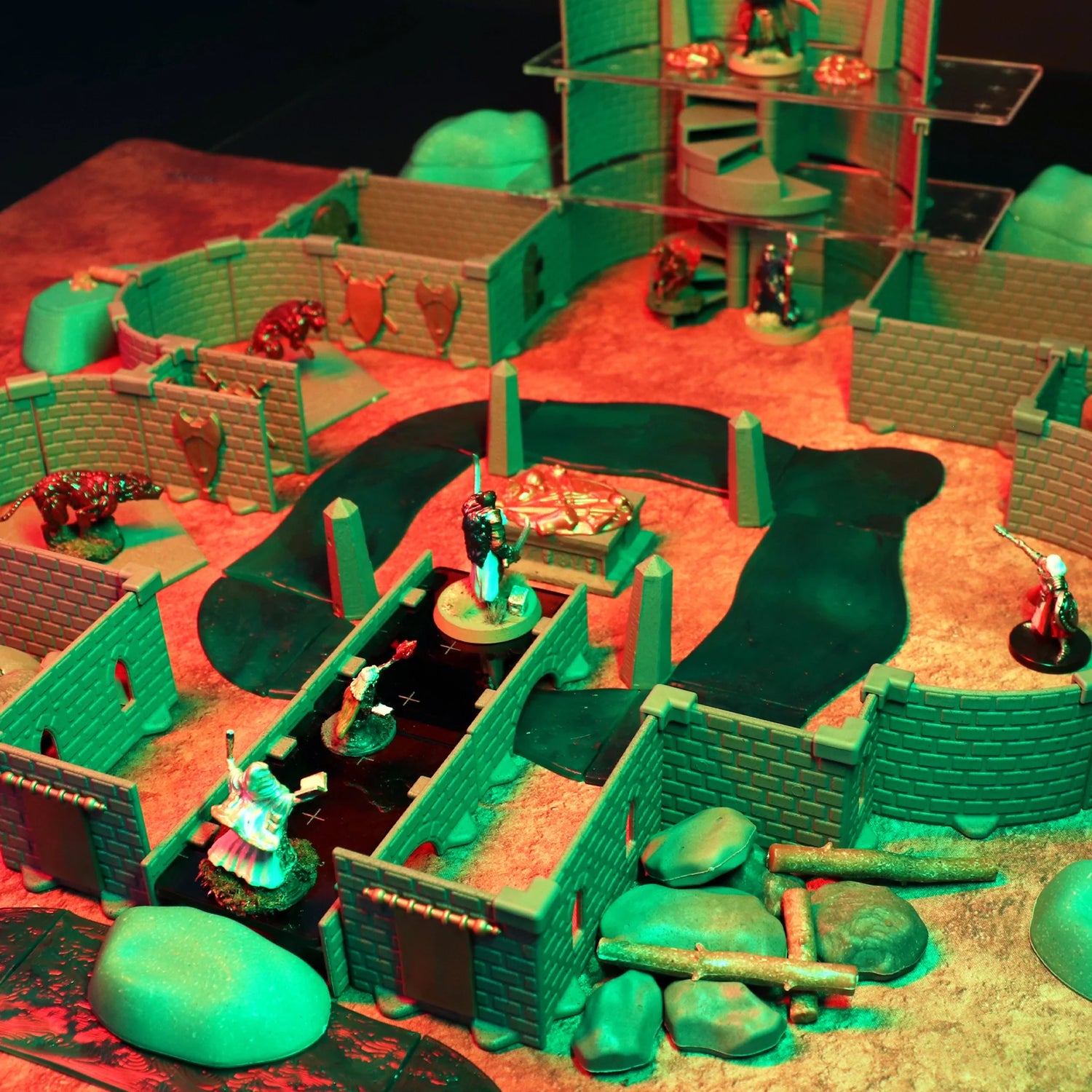 Detailed shot focused on the hazardous Putrid Waterways terrain pieces—the only set featuring green, brackish water. Miniatures are seen fighting near the edge of the dangerous water.