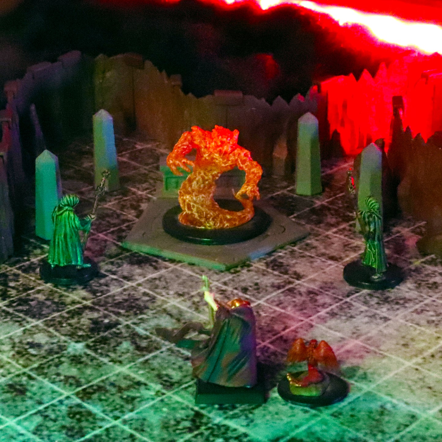 Dramatic TTRPG scene showing wizard miniatures performing a ritual around a glowing Elemental monster on a Summoning Circle, surrounded by tall Obelisks.