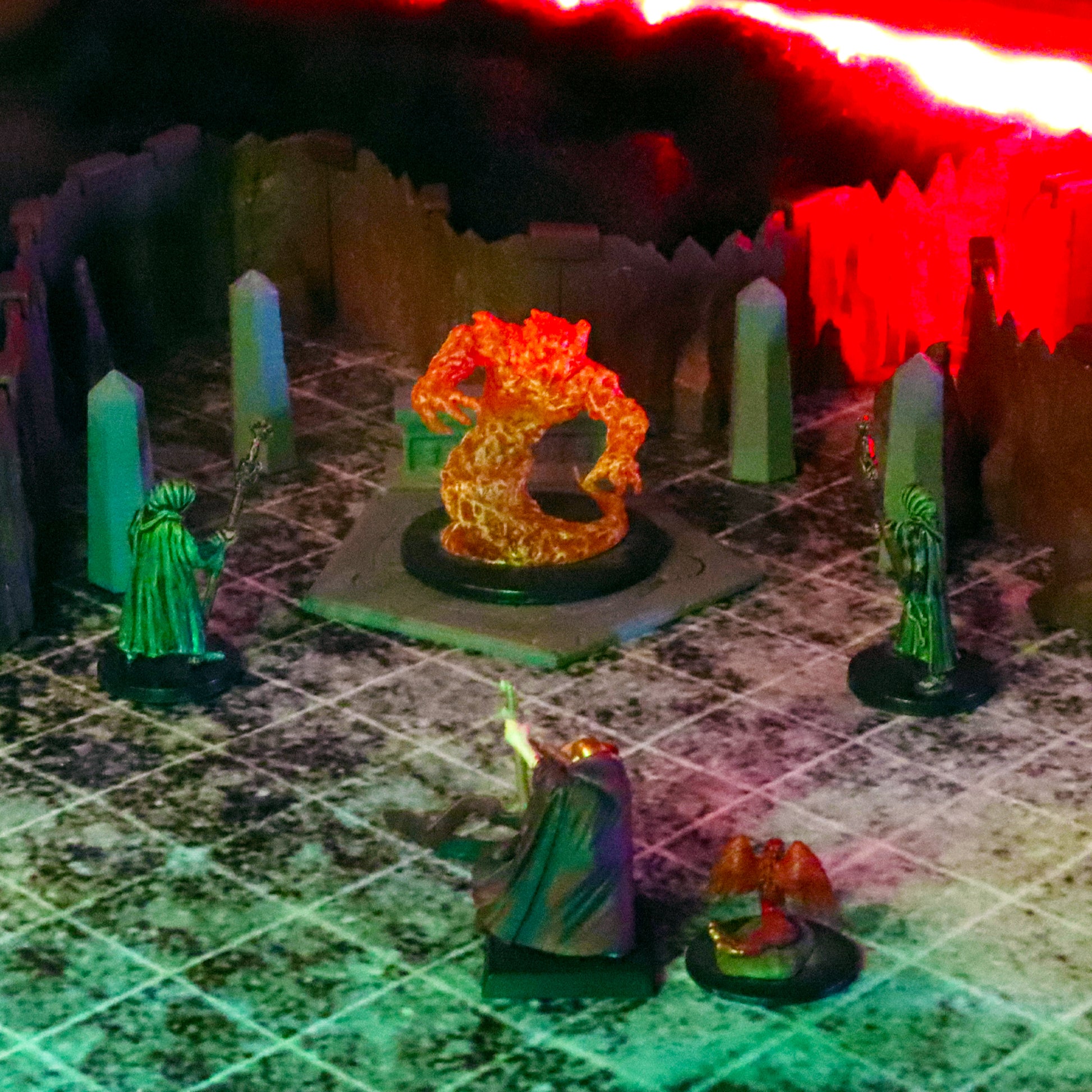 Dramatic TTRPG scene showing wizard miniatures performing a ritual around a glowing Elemental monster on a Summoning Circle, surrounded by tall Obelisks.