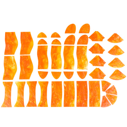 Overhead view of all the individual Lava River tiles laid out, showcasing the pieces that make up the complete kit (various shapes, forks, and ends).