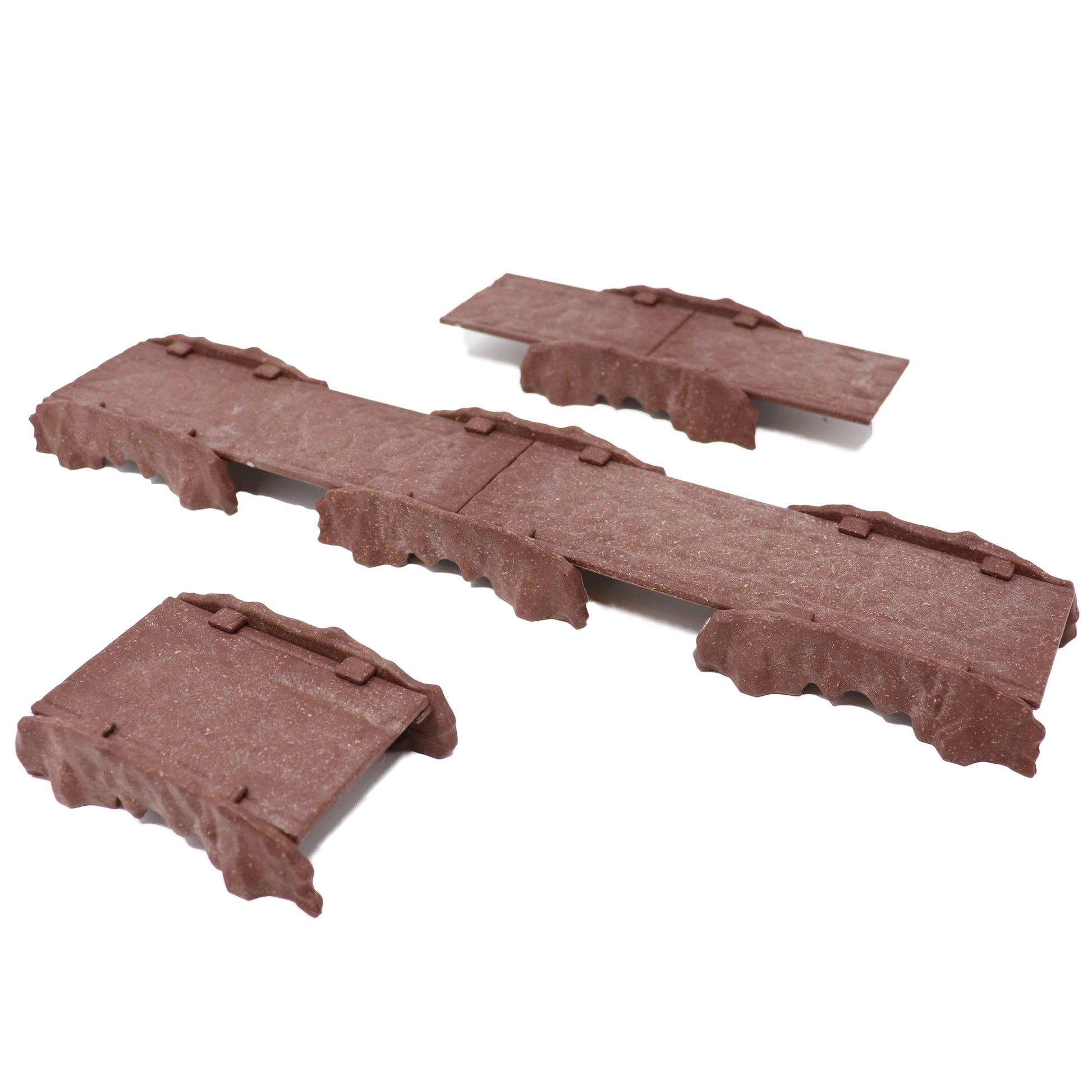 Close-up, isolated product shot showing the modular 3" and 6" Rock Bridge platform pieces with their integrated rock side walls.