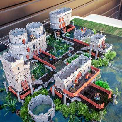 Expansive TTRPG castle terrain built atop the Acrylic Platform Clip system, demonstrating multi-level, walkable elevation.
