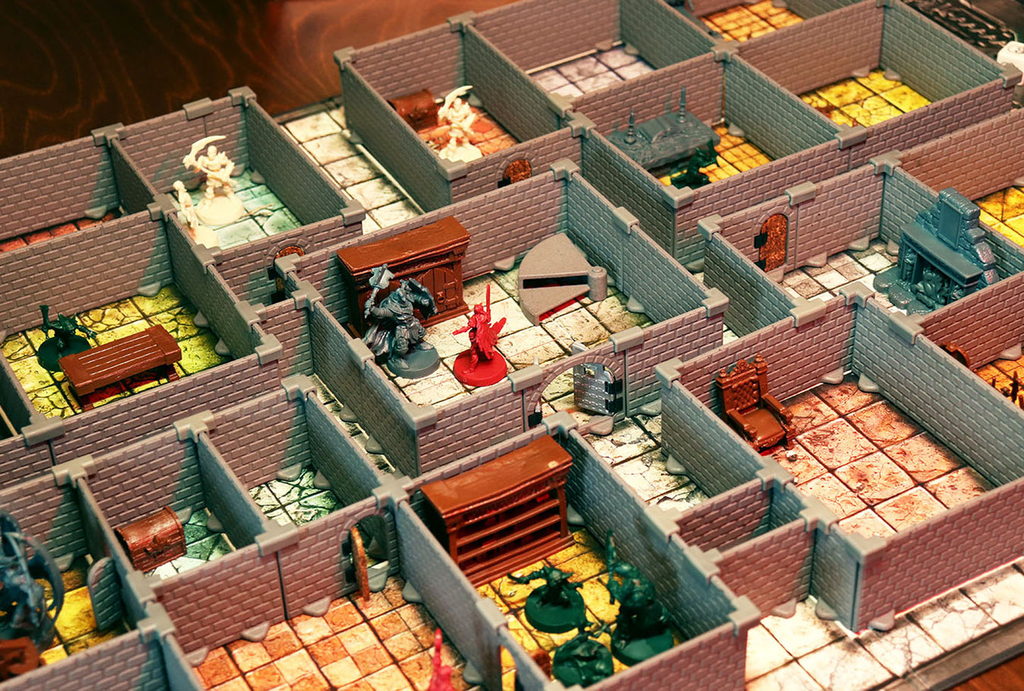 Detailed view of the HQ Set modular dungeon layout with various rooms, closed doors, and many pieces of miniature furniture and monsters.