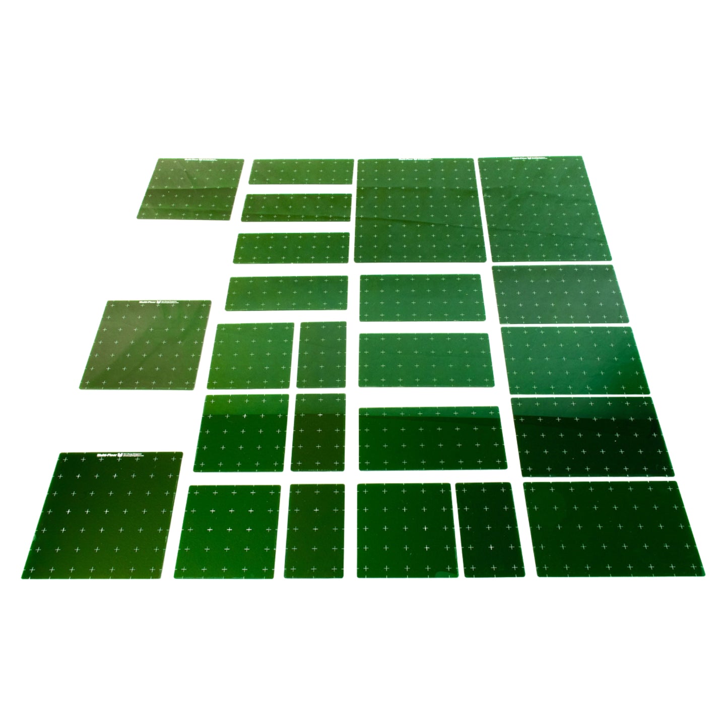 Set of green acrylic platforms on a white background showing the various sizes included in this set. 