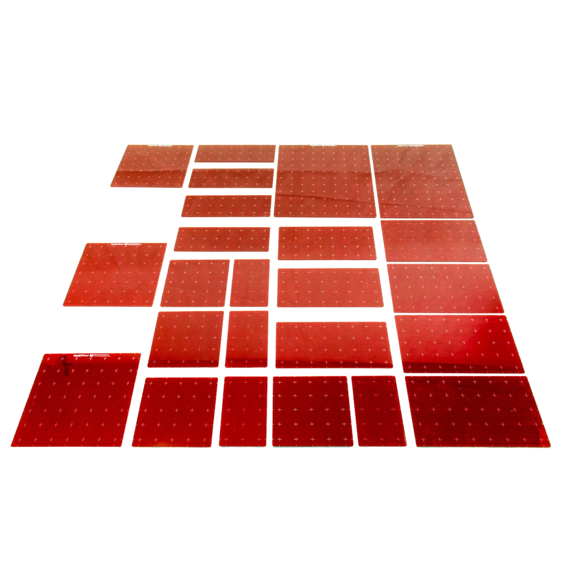 Set of red acrylic platforms on a white background showing the various sizes included in this set.  