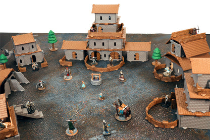 Large modular village or city terrain setup for RPGs, built with DCD walls and the Village Roof Kit pieces on a cobblestone map.