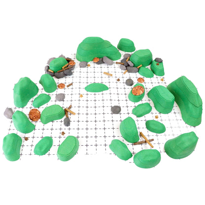 Bird's-eye view of the Owlbear Terrain Core Set arranged on a battlemap grid, clearly showing the scale and placement of the green modular hills and terrain for accurate miniatures movement in a D&D game.