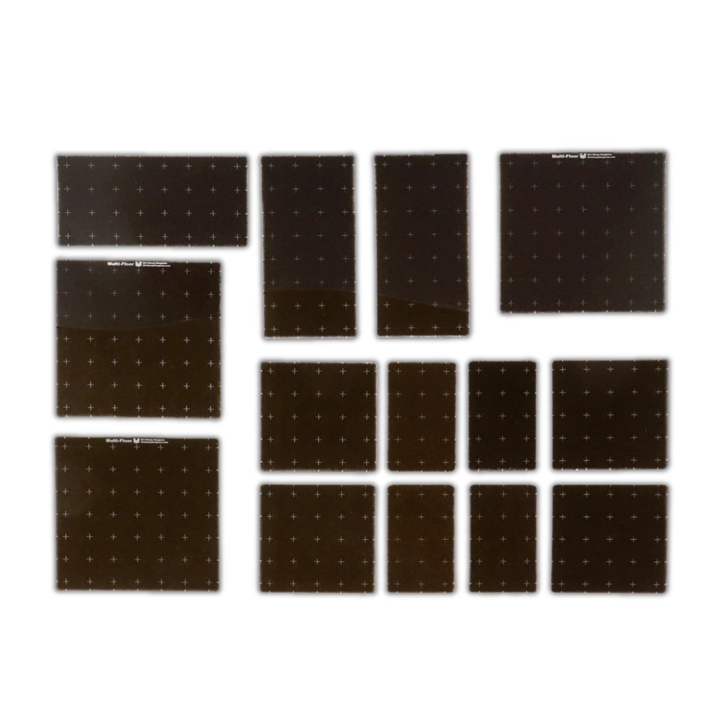 Multi-Floor Platforms Expansion components laid out: various sized clear and smoky dark gray acrylic platform tiles.