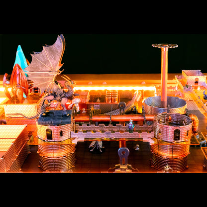 Atmospheric promotional shot of a detailed section of the Regent Castle build, featuring a dragon miniature and a dark, copper-toned industrial theme, lit with dramatic lighting.
