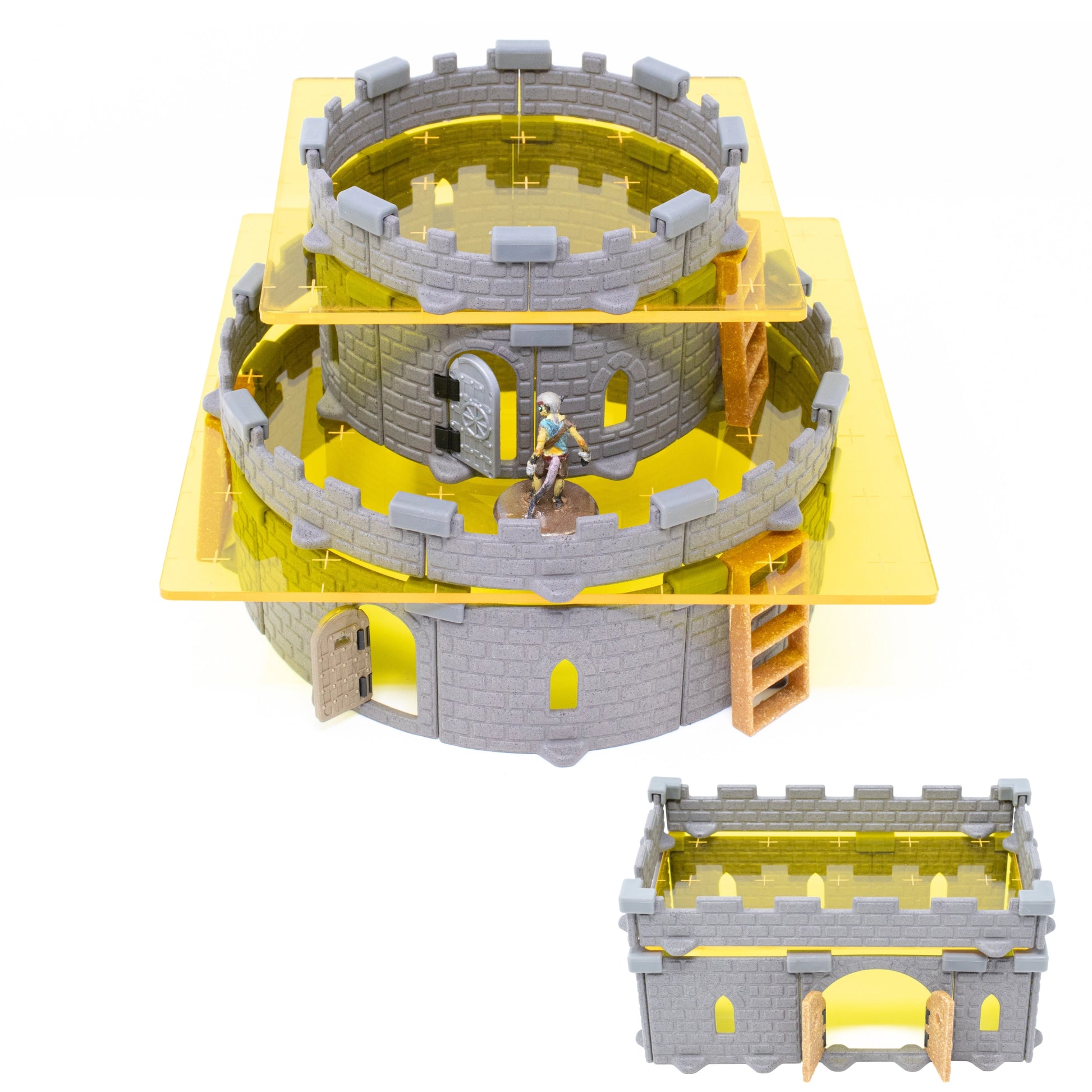 A close up shot of a small tower built with yellow acrylic with a miniature on top as a reference point.   