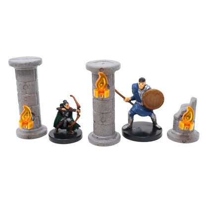 RPG miniatures of an archer and a warrior standing next to modular stone pillars with attached bright torches and a broken pillar.