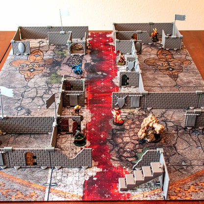 Overhead view of a large, complex modular dungeon layout assembled with the Squire set on a fantasy battlemap. The scene includes various corridors, chambers, doors, stairs, and a collection of Dungeons & Dragons or tabletop RPG miniatures and terrain.