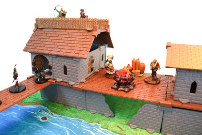 Modular village building with a removable roof tile and an extended balcony, featuring a campfire accessory and miniatures on different levels.