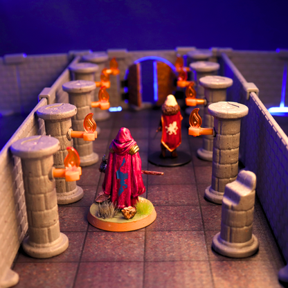 Dungeon hallway scene with multiple pillars and torches lining the walls, focused on a wizard miniature with a staff and dramatic purple lighting.
