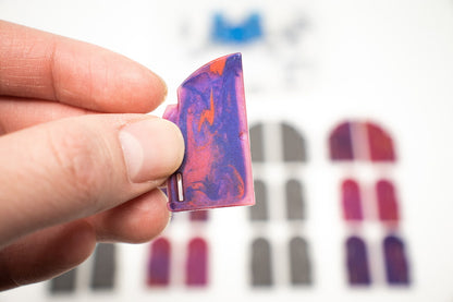 Close-up of the swirled translucent Magic Door pieces (single door) for TTRPG dungeon fantasy terrain.