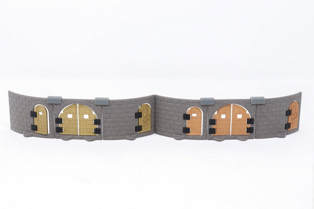 Curved gray dungeon wall section showing six installed doors from the Metallic Doors Expansion, highlighting various designs.